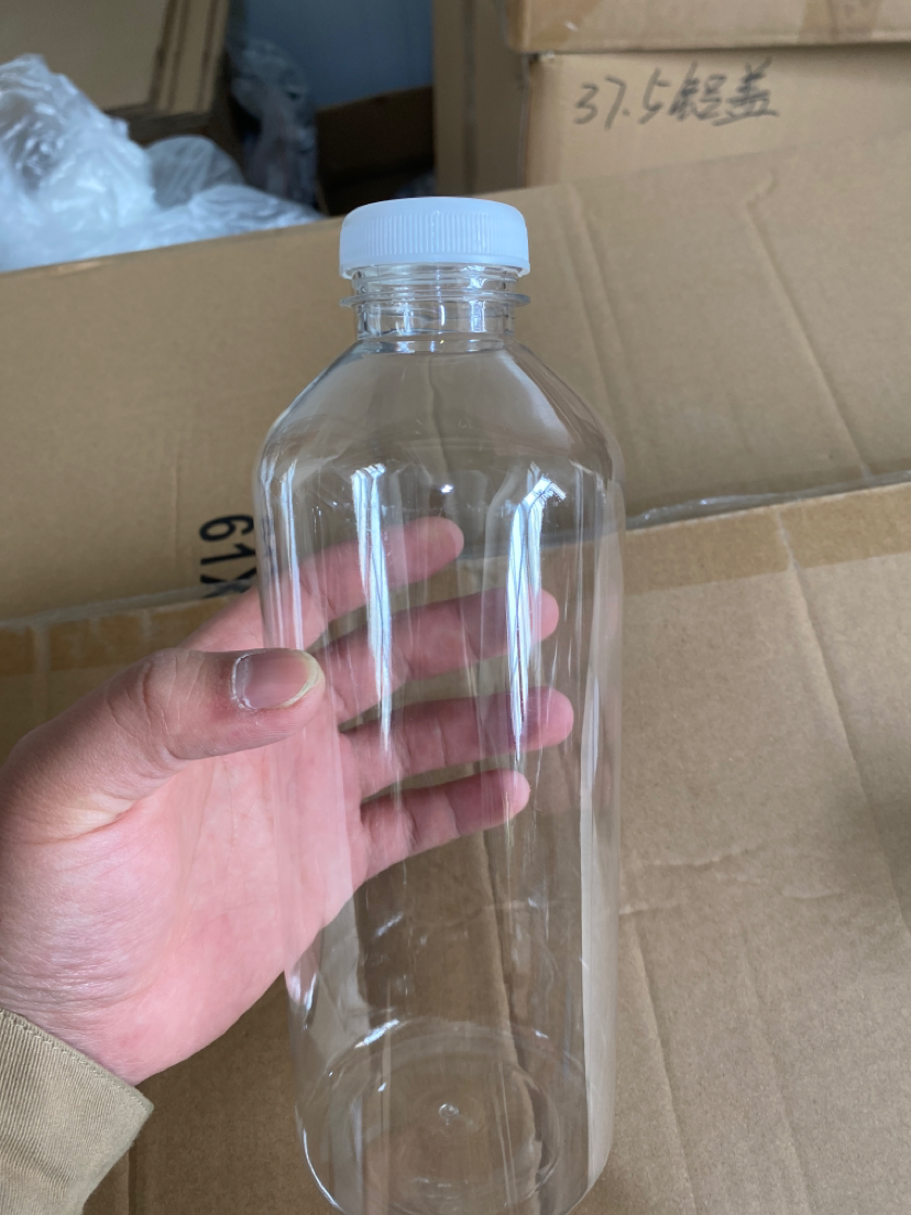 1 Litre 1.5  Litre Juice Plastic Bottle with Black Tamper Proof Cap, Transparent Cylinder Round, LOGO Customization