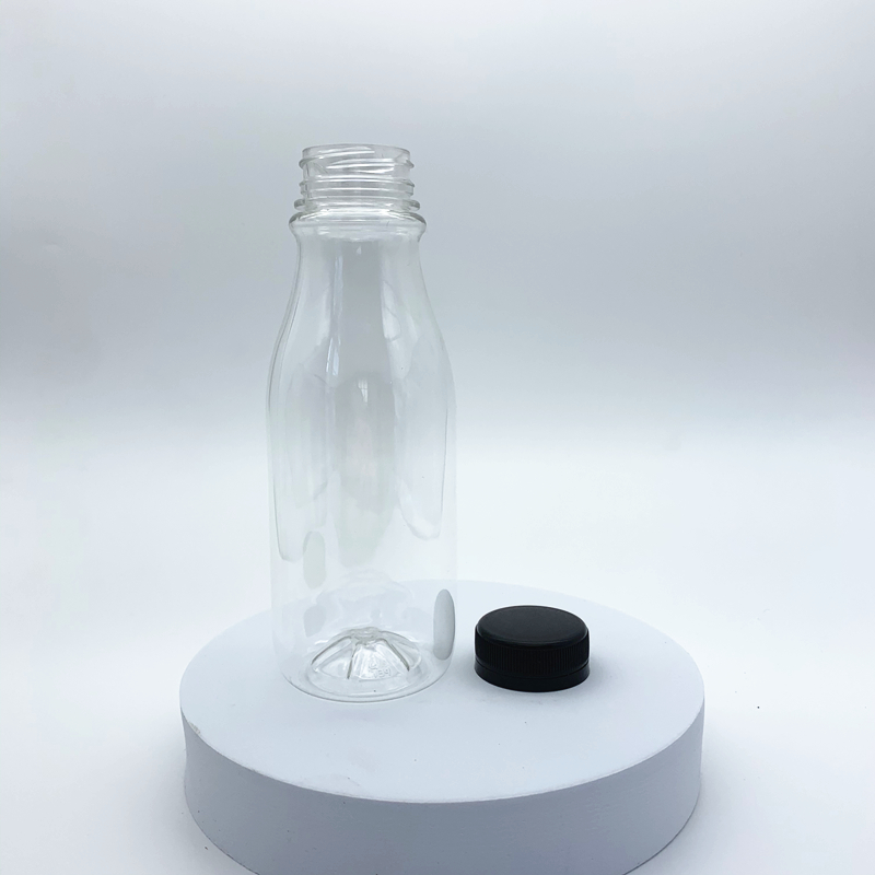 Round Shape Beverage Bottle Clear Empty PET Plastic Juice Drinking Bottles with Lids for Mineral Water Fruit Juice Packaging