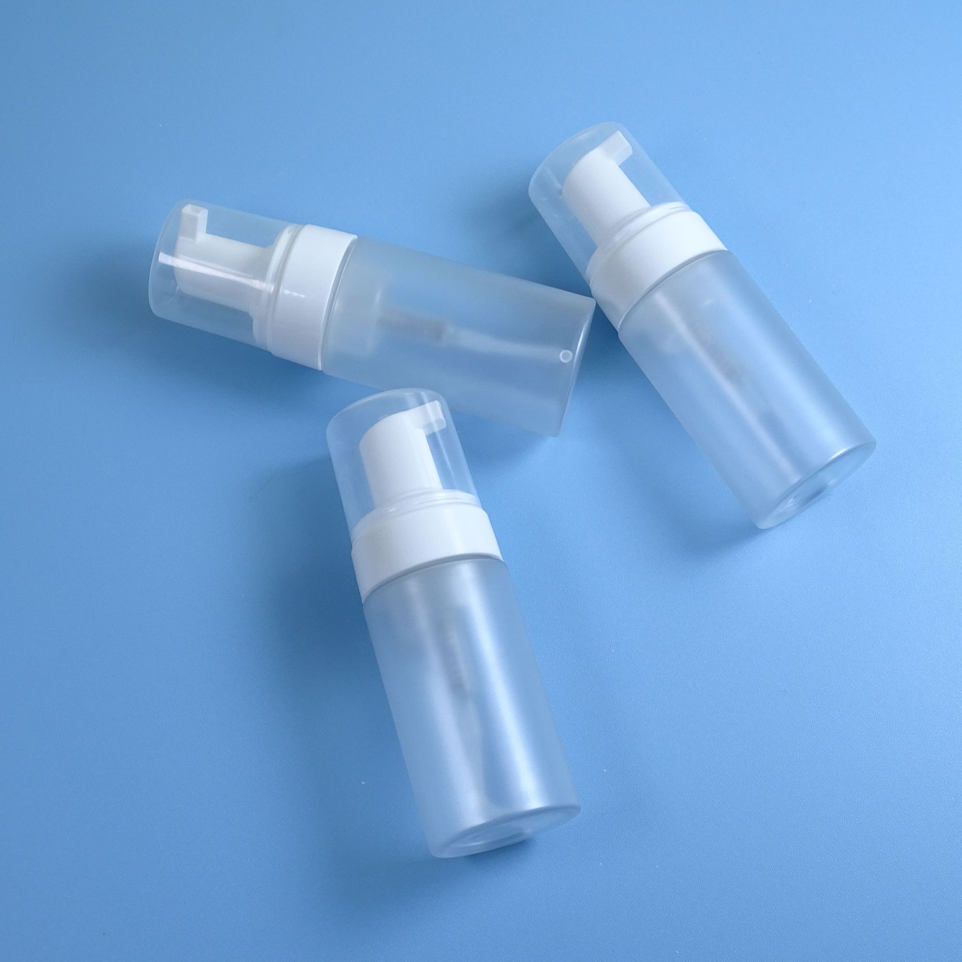 Fancy Clear Frosted Matte Mousse Bottle 50ml 100ml 150ml 200ml Foam Face Wash Cleanser Pump Bottle with Cover & Logo Printing