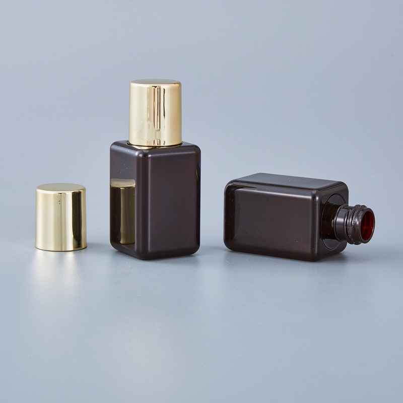 8ml 15ml essential oil bottles 20ml 30ml PET Plastic Amber Toner Perfume Serum Essence Cosmetic Sample Bottle With Nese Gold Lid