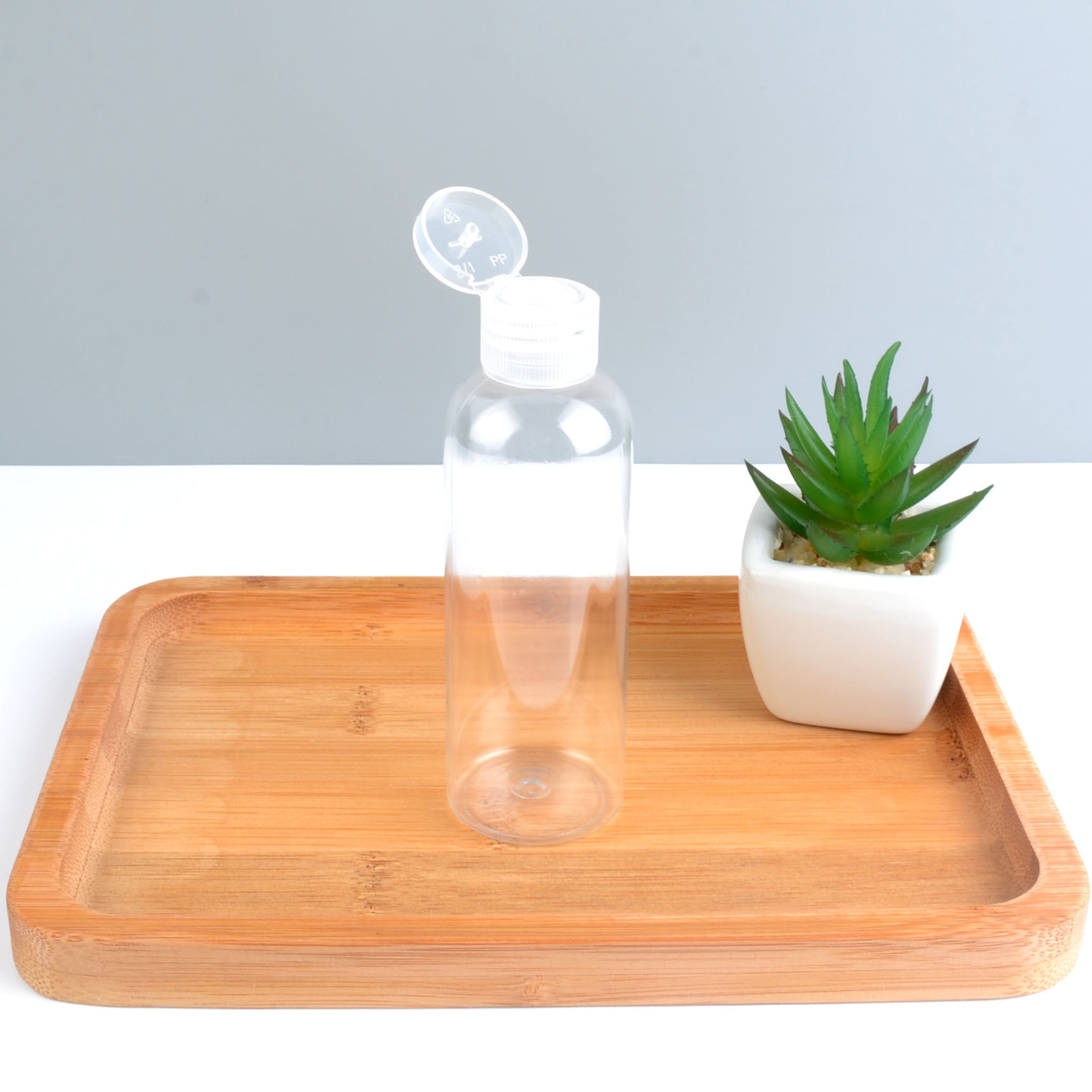 Wholesale Hand Sanitizer Bottle 30ml 50ml Pocket Perfume Container Squeeze Hand Sanitizer Bottles Customized Logo with flip ca