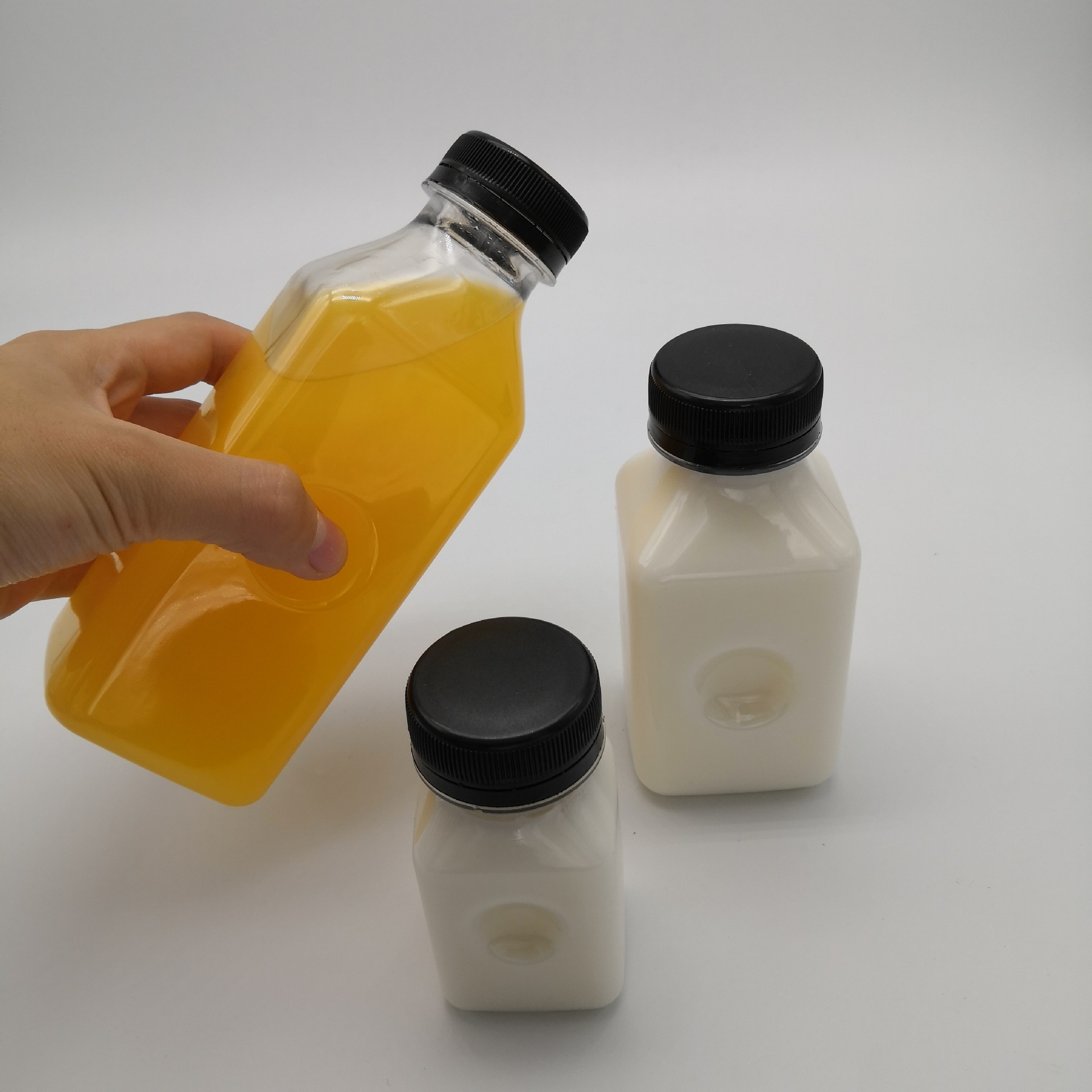 Wholesale Custom 100ML 250ML 400ML 3oz 8oz 10oz Square Bottle PET Plastic Juice Bottles Drink Container with Sealed Caps