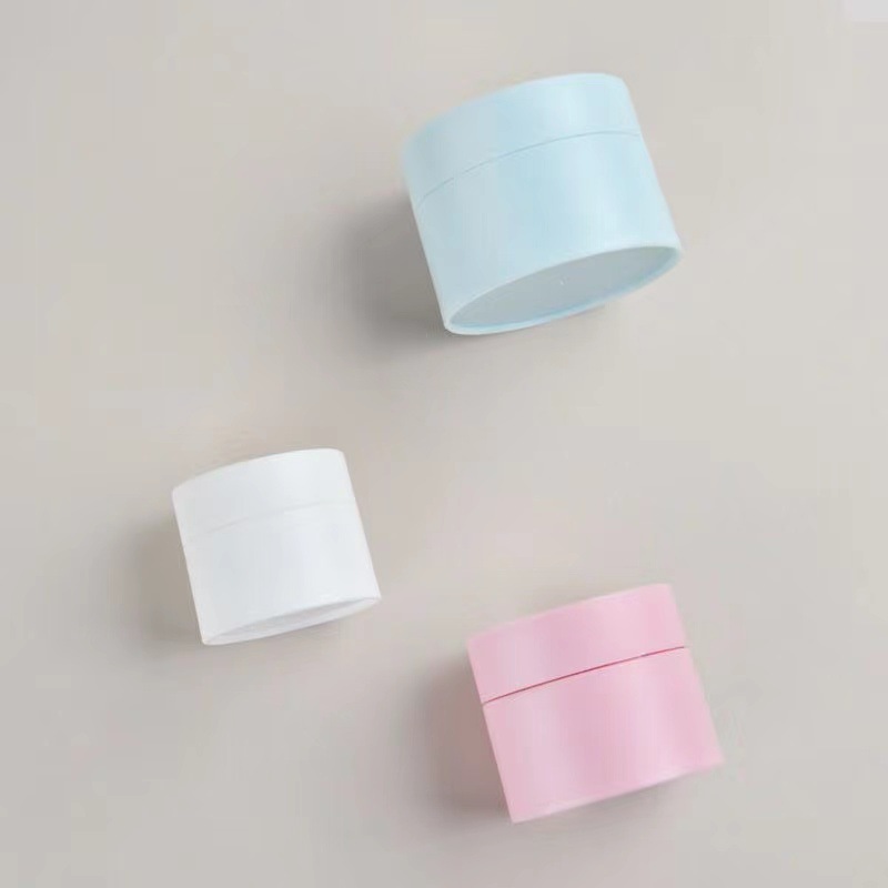 Wholesale 100g Matte Black White Blue Pink plastic cosmetic cream jar with lid P cosmetic packaging face cream container