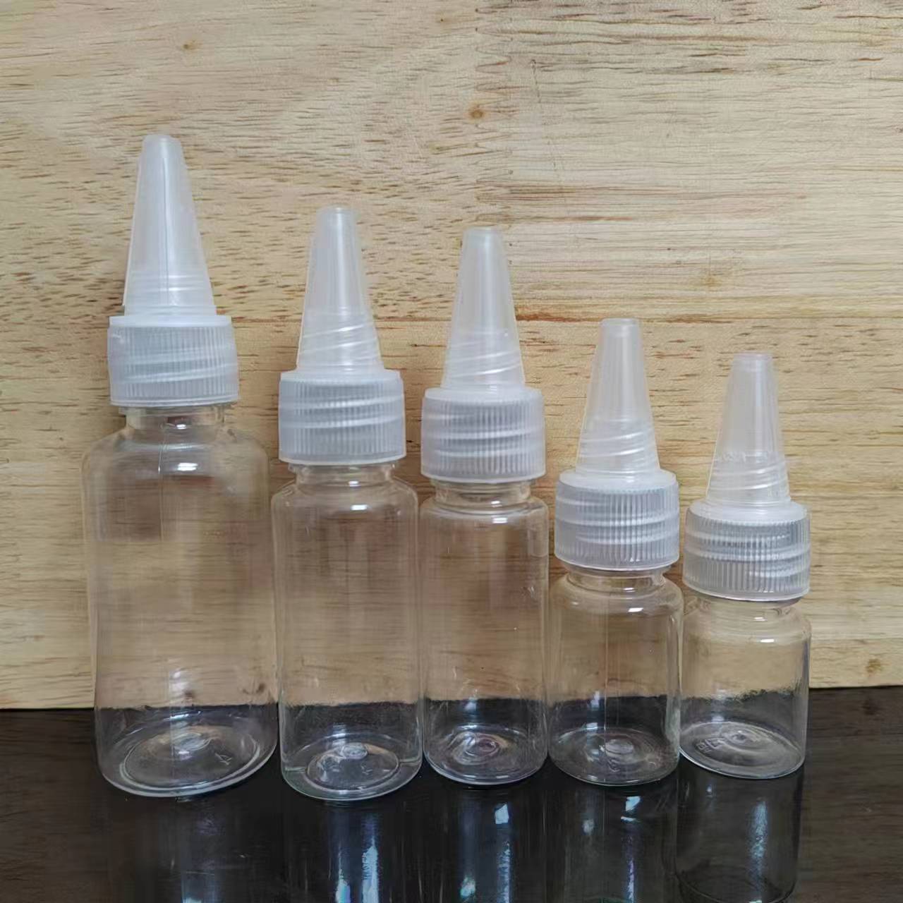 5ml-100ml Transparent plastic bottle with nozzle cap Beauty Salon Hair Oil Squeeze Bottles