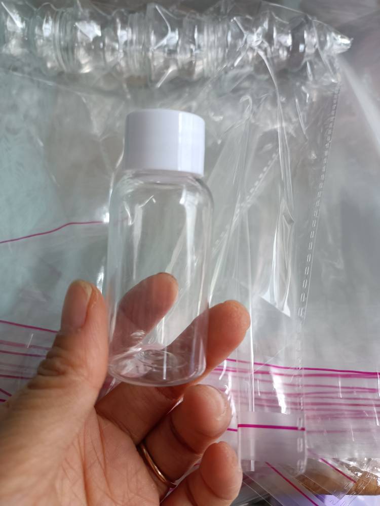 30ml 1 Oz Clear Pet Plastic Boston Round Bottle With 20-410 Neck Finish White Pp Plastic Ribbed Skirt Lid With Foam Liner