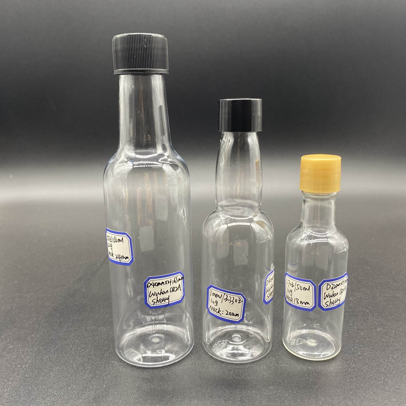 Wholesale 50ml 60ml 100ml 150ml 200ml 2oz 3oz 5oz 250ml Plastic Liquor Bottles 750ml with Cap for Mini Whisky Samples Display