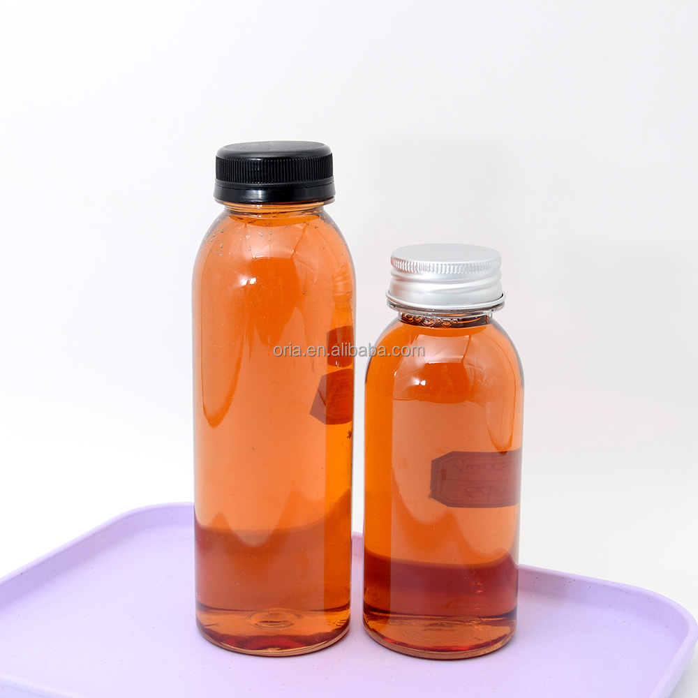 Custom transparent Round Plastic Bottles  250ml 300ml 500ml 1000ml PET food grade juice plastic bottle With  Cap