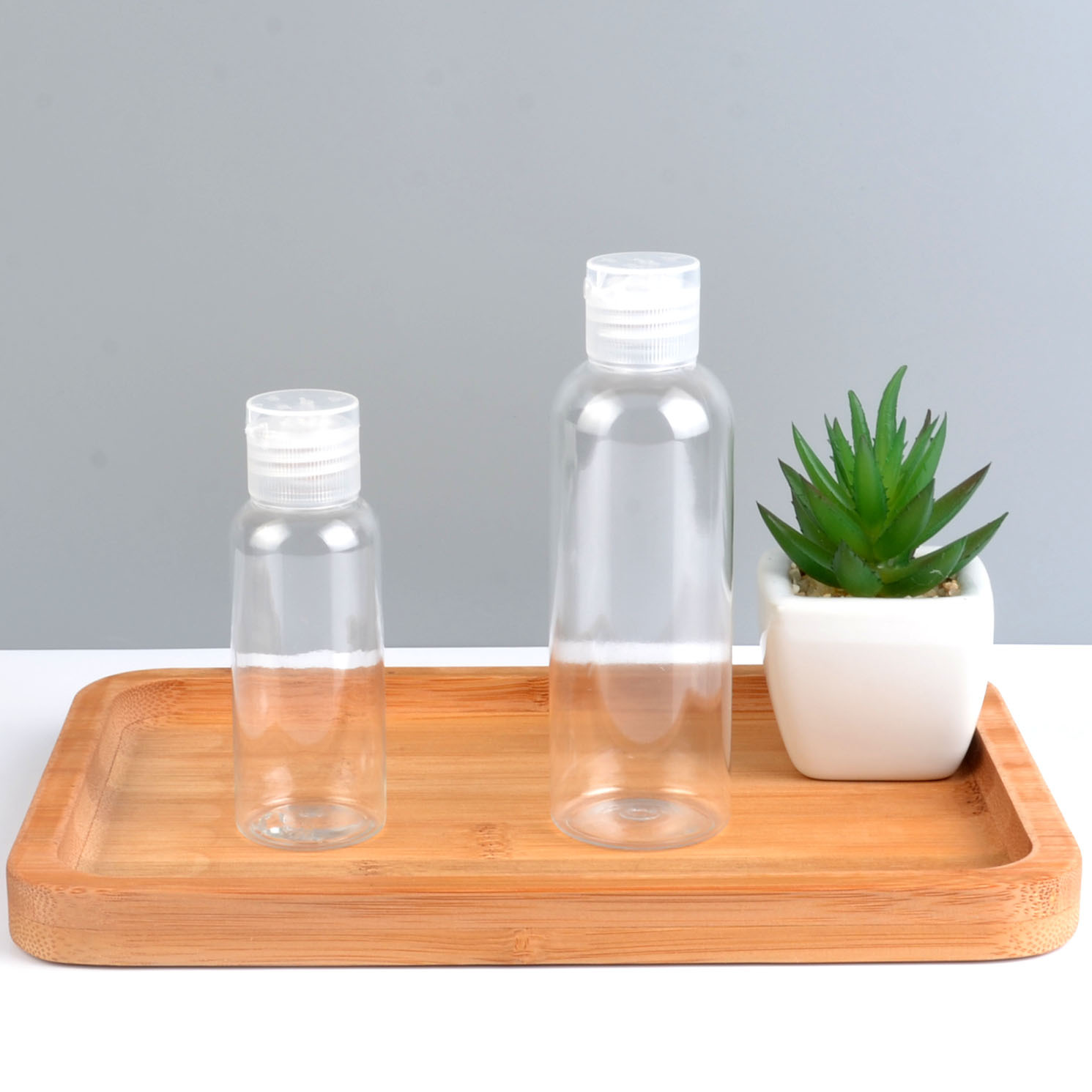 Wholesale Hand Sanitizer Bottle 30ml 50ml Pocket Perfume Container Squeeze Hand Sanitizer Bottles Customized Logo with flip ca