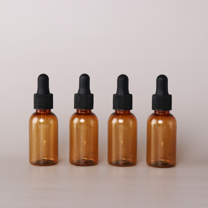 Custom Empty PET Plastic 5ml 10ml 15ml 20ml 30ml 40ml Amber Mini Luxury Essential Oil Bottle Serum Flat Shoulder Dropper Bottle