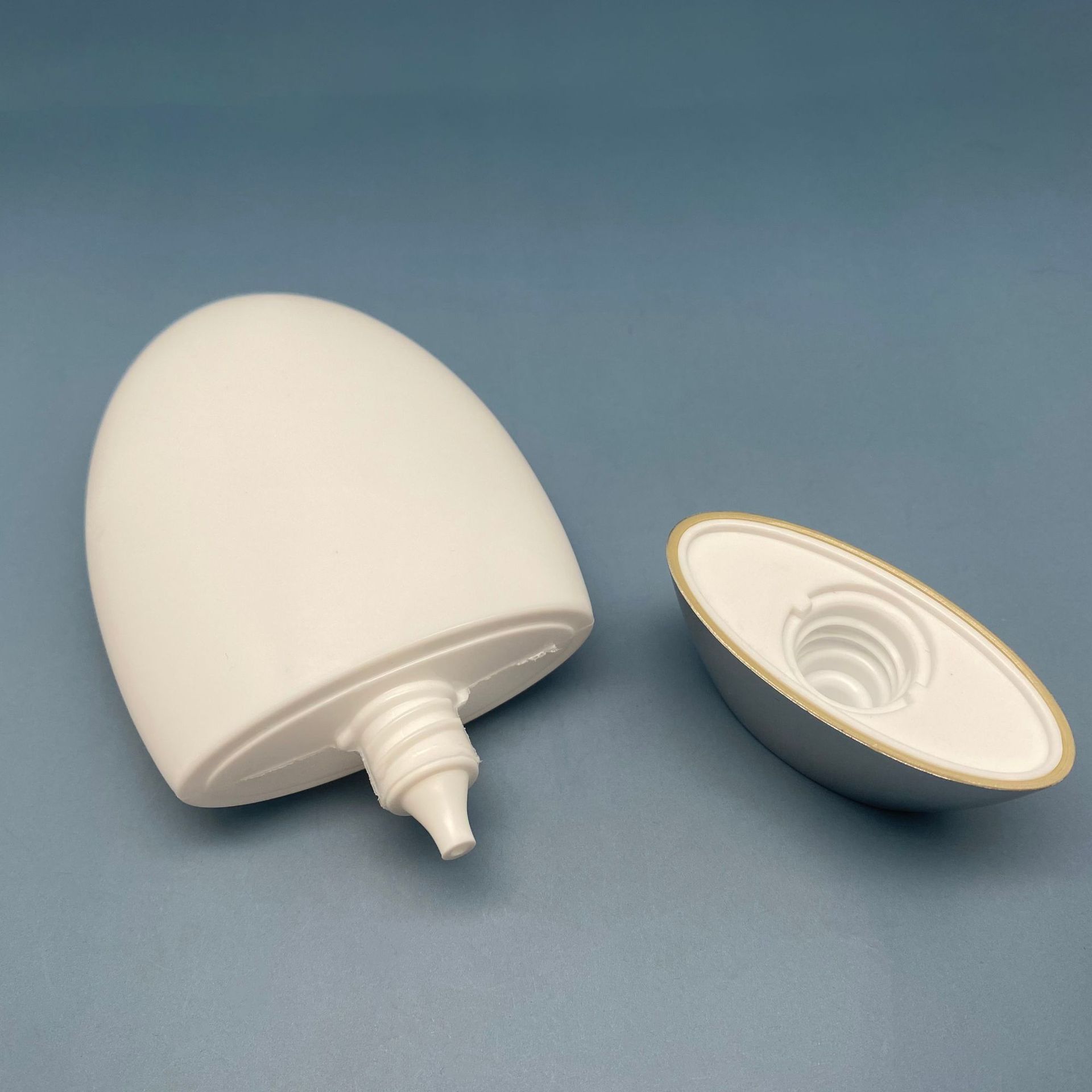 Custom Logo Empty Squeeze Sunscreen Sunblock Cream Bottle egg shape squeezable hand cream container Plastic Squeeze Bottle