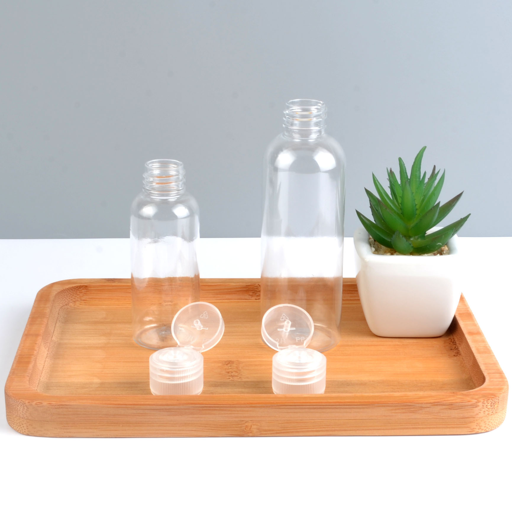 Wholesale Hand Sanitizer Bottle 30ml 50ml Pocket Perfume Container Squeeze Hand Sanitizer Bottles Customized Logo with flip ca